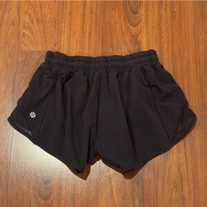 Lululemon Hotty Hot Shorts Size 4 Black 2.5” length ALO Vuori Free People